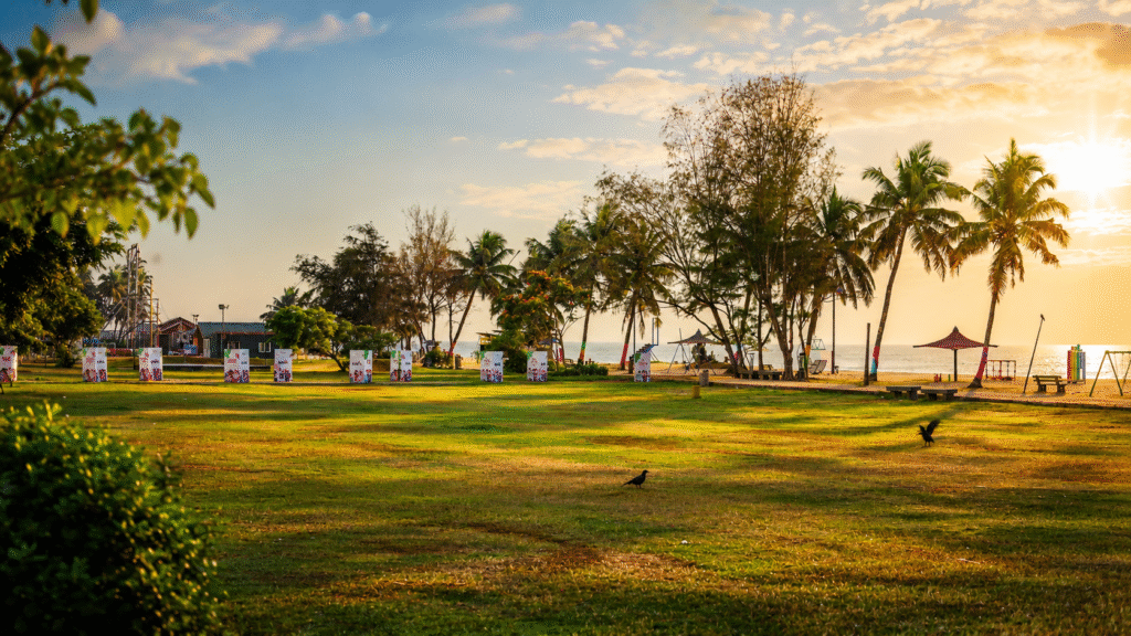 Open-air event venue in Kasaragod with a lawn setting.